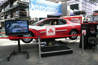Illustration for article titled Play With It: Top Seven Examples Of Automaker-Video Game Industry Love-Making In New York